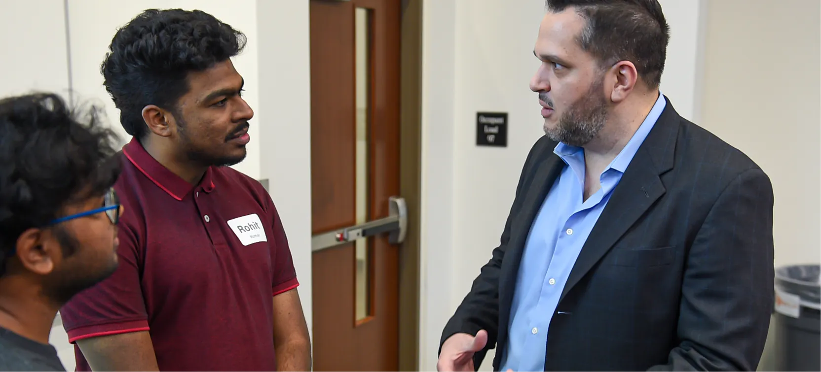 Mentors networking with students